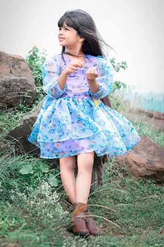 Floral Printed frock with flower on waist.