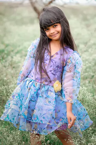 Floral Printed frock with flower on waist.