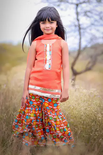 Orange Printed Short Kurta with Flower print sharara and Dupatta