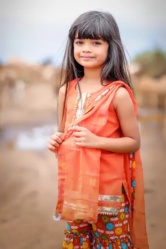 Orange Printed Short Kurta with Flower print sharara and Dupatta