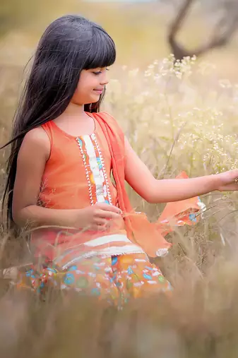 Orange Printed Short Kurta with Flower print sharara and Dupatta
