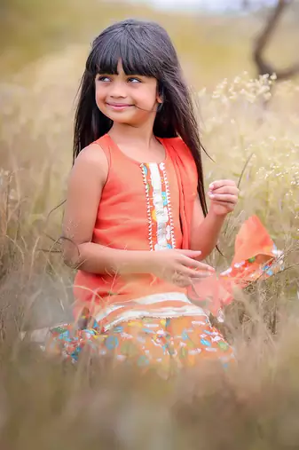 Orange Printed Short Kurta with Flower print sharara and Dupatta