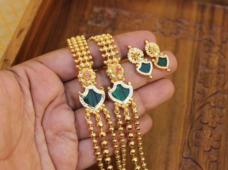 Gold plated kerala style green layer necklace