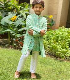 Green Embroidered Kurta with offwhite Chudidar