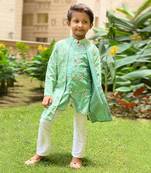Green Embroidered Kurta with offwhite Chudidar