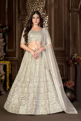 Cream thread embroidery net  lehenga 1