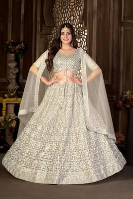 Cream thread embroidery net  lehenga 2