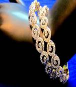 Runjhun Beautiful CZ/AD Studded Gold Plated Traditional White American Diamond Bangles Set of 2 for Women