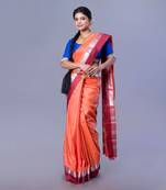 Kanjivaram silk saree in rust color with maroon and silver border