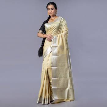 Kanjivaram silk saree in acid green color with dull zari motifs and border 1