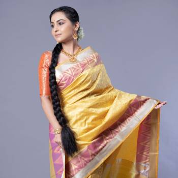 Kanjivaram silk saree in acid green color with dull zari motifs and border 2