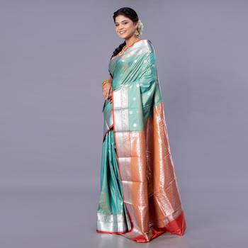 Kanjivaram silk saree in forest green color with silver zari motifs 3