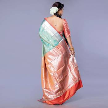 Kanjivaram silk saree in forest green color with silver zari motifs 4
