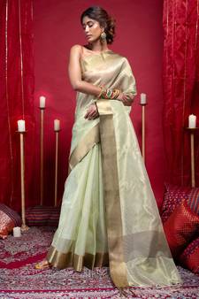 Banarasi kora organza saree in olive green color with copper zari border