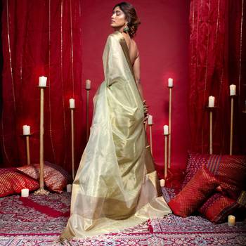 Banarasi kora organza saree in olive green color with copper zari border 4
