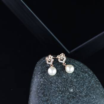 Valentine's Special Rose Gold-Plated AD Stone Contemporary Studs Earrings for women  2