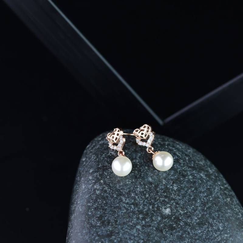 Valentine's Special Rose Gold-Plated AD Stone Contemporary Studs Earrings for women 