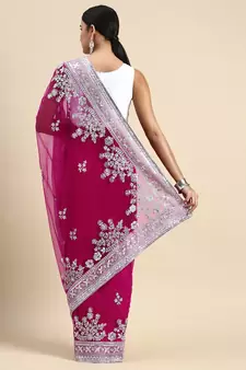 Dark pink embroidered net saree with blouse