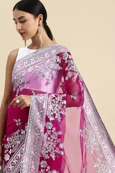 Dark pink embroidered net saree with blouse