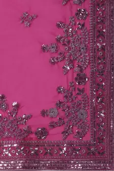 Dark pink embroidered net saree with blouse