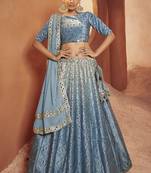 SKY BLUE SEQUINS EMBROIDERED WITH MIRROR WORK VELVET FESTIVE & PARTY WEAR SEMI STITCHED LEHENGA