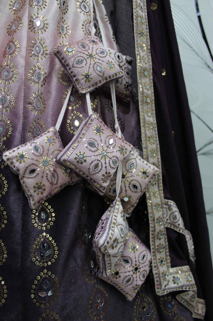 PURPLE SEQUINS EMBROIDERED WITH MIRROR WORK VELVET FESTIVE & PARTY WEAR SEMI STITCHED LEHENGA