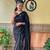 Black woven georgette saree with blouse