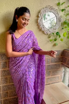 Purple woven georgette saree with blouse