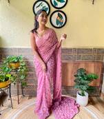 Pink woven georgette saree with blouse