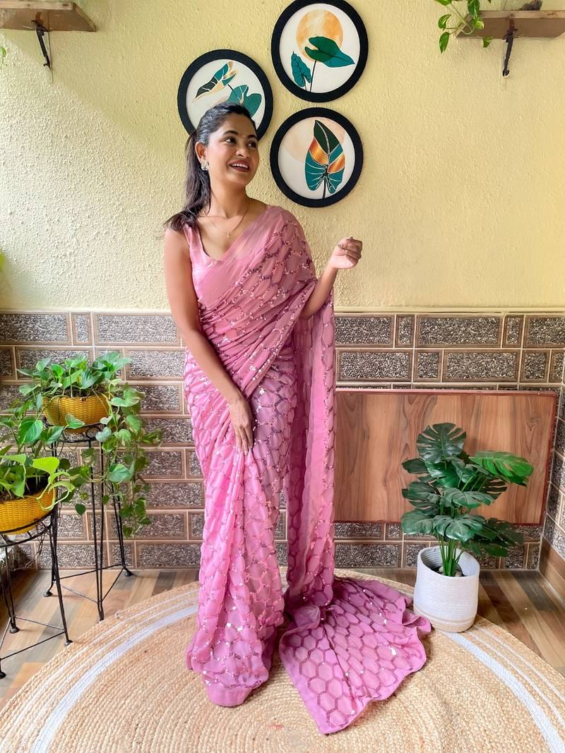 Pink woven georgette saree with blouse