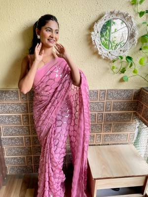 Pink woven georgette saree with blouse 2