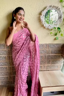 Pink woven georgette saree with blouse