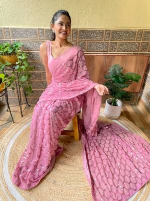 Pink woven georgette saree with blouse 3