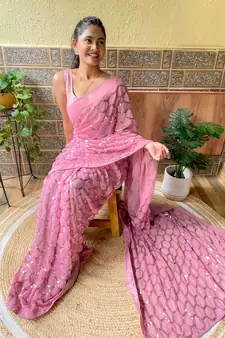 Pink woven georgette saree with blouse