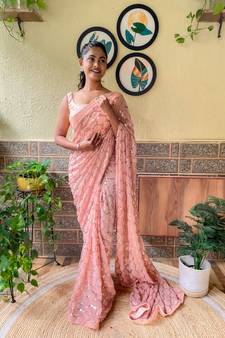 Cream woven georgette saree with blouse