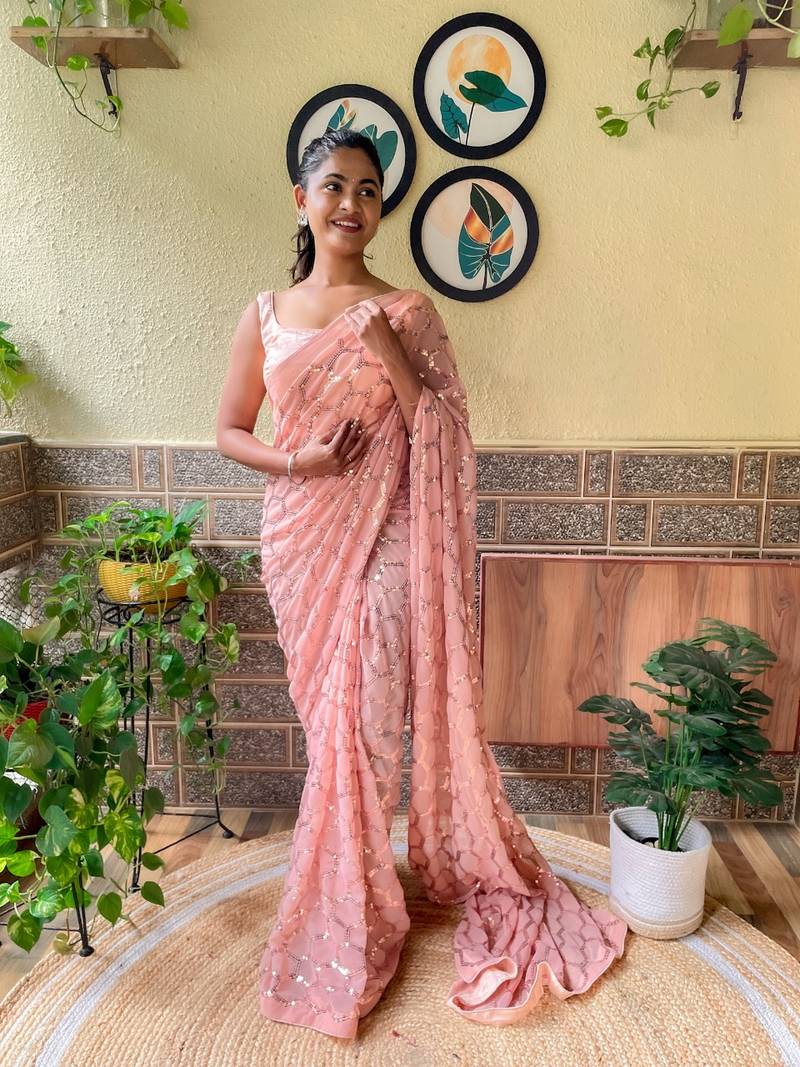 Cream woven georgette saree with blouse