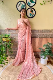 Cream woven georgette saree with blouse
