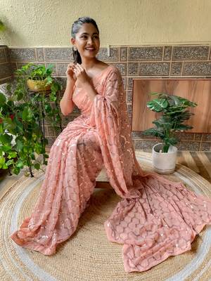 Cream woven georgette saree with blouse 4