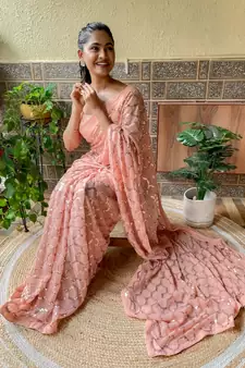 Cream woven georgette saree with blouse