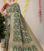 Green woven Faux kanchipuram silk saree with blouse