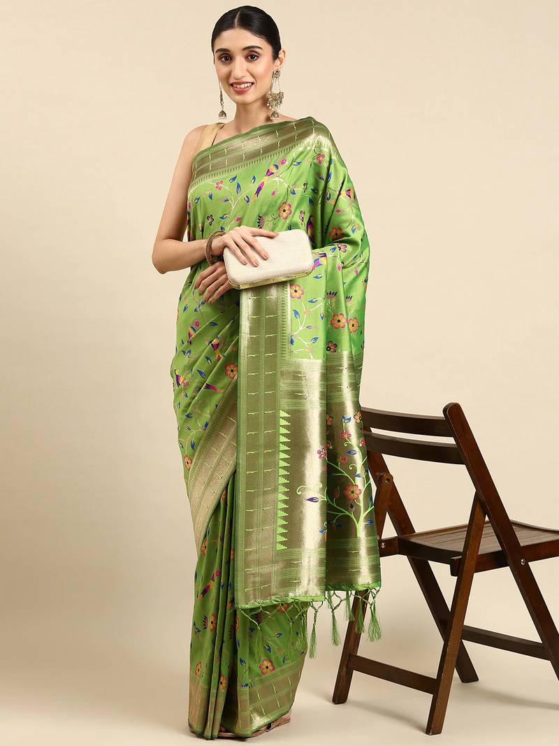 Light green woven kanchipuram silk saree with blouse