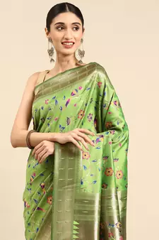 Light green woven kanchipuram silk saree with blouse
