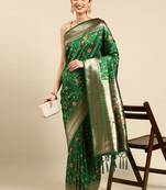 Dark green woven kanchipuram silk saree with blouse