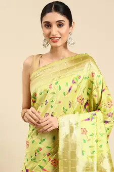 Light green woven kanchipuram silk saree with blouse