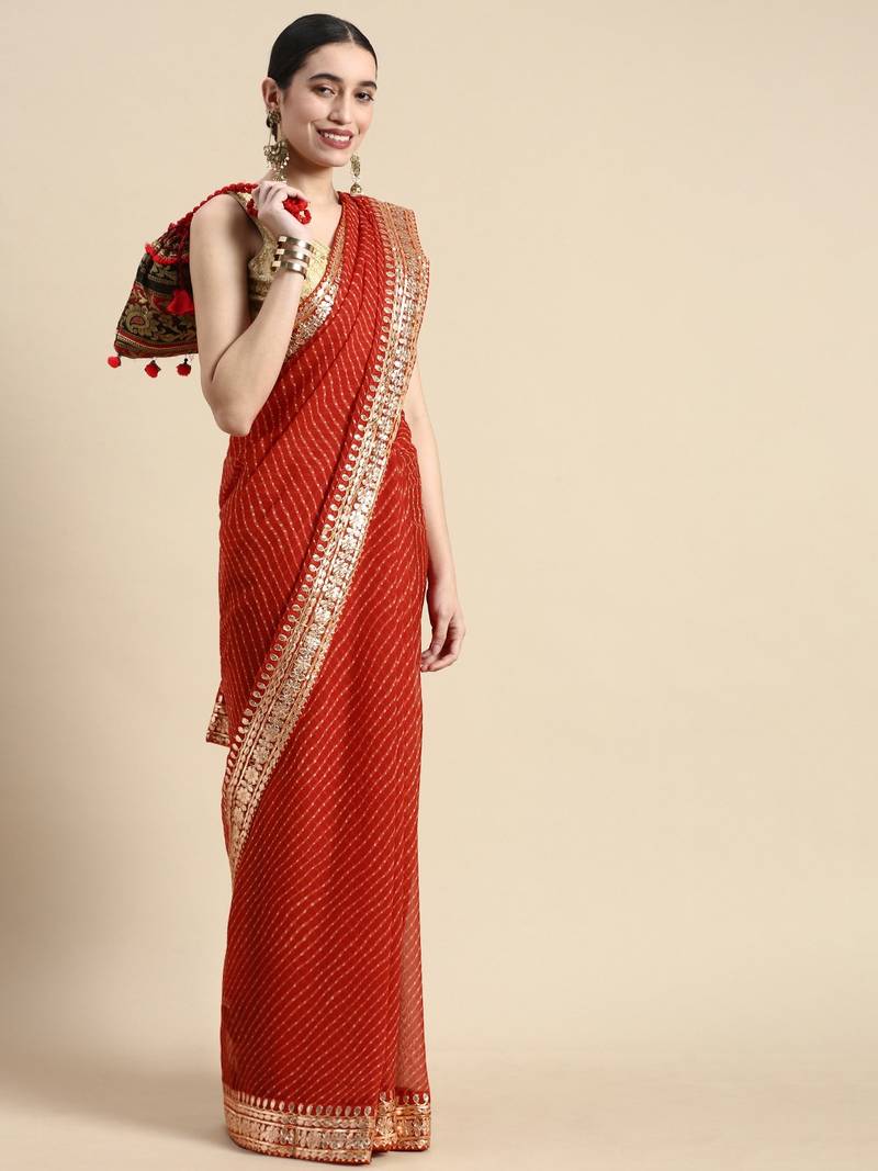 Red embroidered georgette saree with blouse