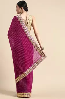 Pink embroidered georgette saree with blouse