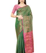 Green woven Banarasi silk blend saree with blouse