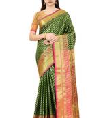 Dark green woven Banarasi silk blend saree with blouse