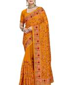 Mustard embroidered georgette saree with blouse