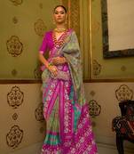 Green woven patola saree with blouse